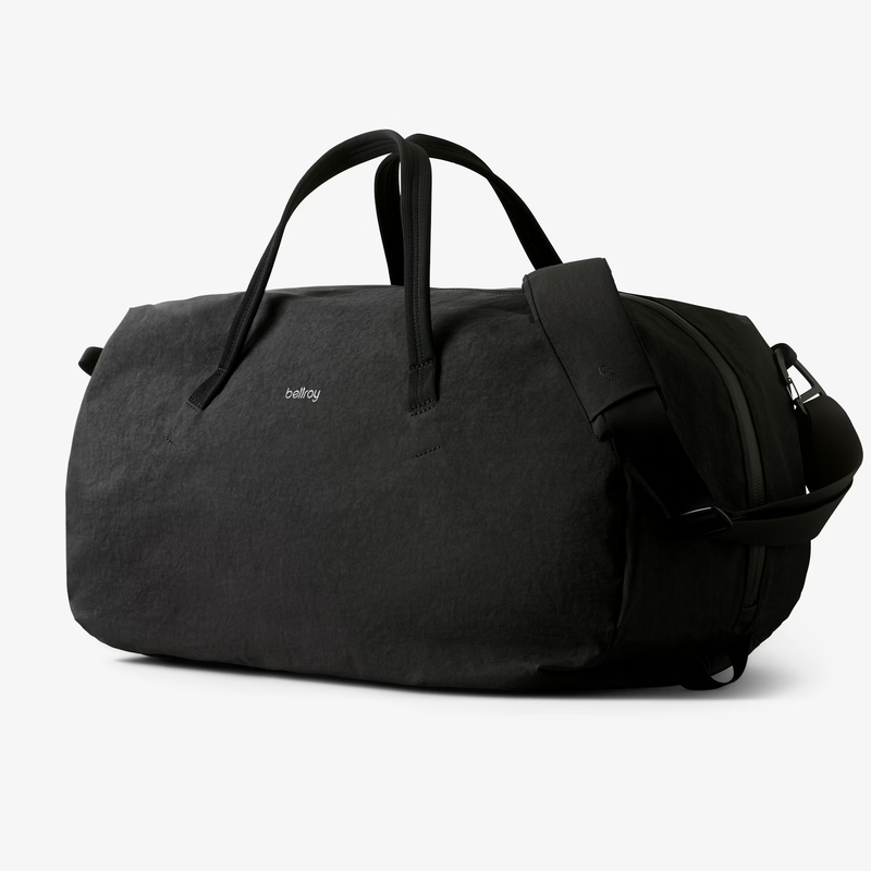 Bellroy Venture Duffel 55L in black, showing the spacious design with durable fabric and adjustable shoulder straps.