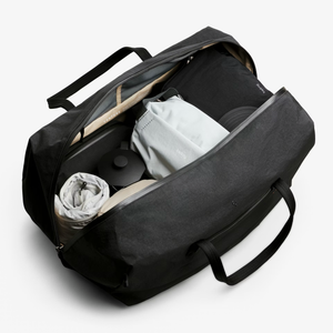 Bellroy Venture Duffel 55L in black, showing spacious main compartment and durable carry handles, ideal for travel and outdoor use