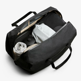 Bellroy Venture Duffel 55L in black, showing spacious main compartment and durable carry handles, ideal for travel and outdoor use