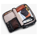 Bellroy Lite Carry-On luggage in ash color, showing a sleek carry-on bag with smooth wheels and handle for travel.