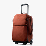 Bellroy Lite Carry-On luggage in ash color, featuring sleek design with wheels and handle for easy travel.