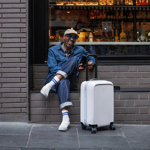Bellroy Transit Carry-On luggage in bronze, featuring sleek design and durable materials for convenient travel storage.