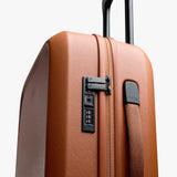Bellroy Transit Carry-On luggage in bronze with sleek design, durable material, and compact size for travel convenience.