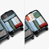 Bellroy Transit Carry-On luggage in bronze color, featuring sleek design with sturdy handles and smooth wheels for travel.