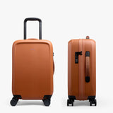 Bellroy Transit Carry-On luggage in bronze, showing its sleek exterior with a sturdy handle and compact design for travel.