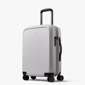 Bellroy Transit Carry-On Large luggage in chalk color, durable carry-on bag with multiple compartments for travel convenience.