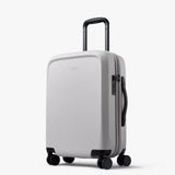 Bellroy Transit Carry-On Large luggage in chalk color, durable carry-on bag with multiple compartments for travel convenience.