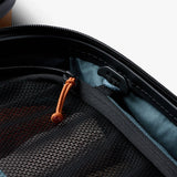 Bellroy Transit Carry-On Large luggage in chalk color, showing sleek carry-on design with handles and zipper closure.