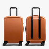 Bellroy Transit Carry-On Large luggage in chalk color, showing durable fabric and sleek design with handle and wheels.