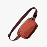 Bellroy Lite Belt Bag showing its compact design with adjustable strap and sleek black exterior.