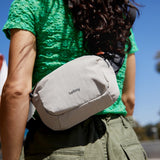 Bellroy Lite Belt Bag in sleek black with adjustable strap and compact design, ideal for carrying essentials comfortably.