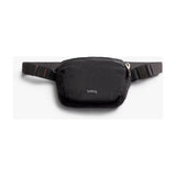 Bellroy Lite Belt Bag showing its compact design, adjustable strap, and sleek exterior in neutral color.