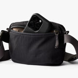 Bellroy Lite Belt Bag in black with adjustable strap and multiple compartments for convenient carrying
