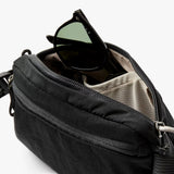 Bellroy Lite Belt Bag showing compact design with adjustable strap and front zipper pocket for everyday organization.