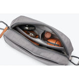 Bellroy Tokyo Crossbody bag in black leather, featuring a sleek design with adjustable strap and multiple compartments.