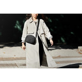 Bellroy Tokyo Crossbody bag with adjustable strap and multiple compartments, made of durable, stylish material.