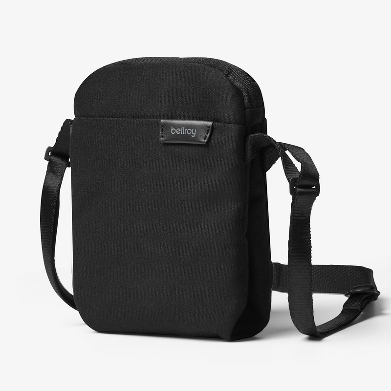 Black Bellroy City Pouch crossbody bag with multiple compartments and adjustable strap, designed for organization and everyday use.