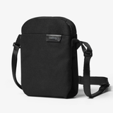 Black Bellroy City Pouch crossbody bag with multiple compartments and adjustable strap, designed for organization and everyday use.