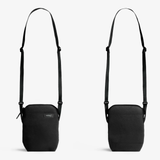 Bellroy City Pouch crossbody bag in black with multiple compartments, compact design, and adjustable strap for everyday use.