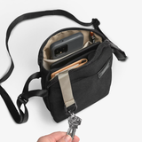 Black Bellroy City Pouch crossbody bag with sleek design and adjustable strap, made for organized everyday carry.