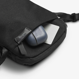 Black Bellroy City Pouch crossbody bag with adjustable strap and multiple compartments, stylish and functional for everyday use.