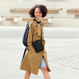 Bellroy City Pouch crossbody bag in black with adjustable strap and multiple compartments for organized daily carry.