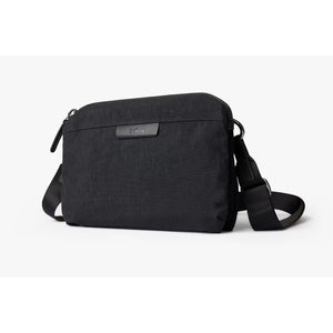 Bellroy Tokyo Side Bag in raven, a stylish crossbody bag with sleek design and adjustable strap for everyday use.