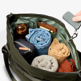 Bellroy Classic Getaway Duffel Bag in black with adjustable shoulder strap and multiple compartments for travel storage.