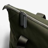Bellroy Classic Getaway Duffel Bag in sleek black with leather accents, showing its spacious design and sturdy handles.