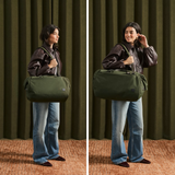 Bellroy Classic Duffel 35L bag in black with sturdy handles and adjustable shoulder strap, showing its spacious design and durable material.