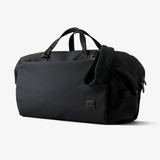 Bellroy Classic Duffel 35L navy travel bag with adjustable shoulder strap and spacious main compartment.