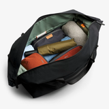 Bellroy Classic Duffel 45L in black, showing spacious main compartment and durable fabric for travel and gym use.