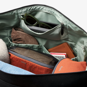 Bellroy Classic Duffel 45L bag with black fabric, sturdy handles, and a spacious main compartment for travel and storage.