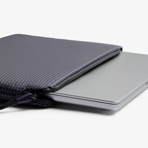 Bellroy Lite Laptop Sleeve 14-inch in arcade gray, slim protective case with soft interior for MacBook and laptops.