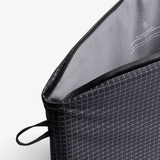 Bellroy Lite 14-inch gray laptop sleeve, slim protective case with smooth fabric exterior and minimalist design.