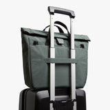 Bellroy Tokyo Messenger Bag 14-inch in Everglade color with multiple compartments and adjustable strap, designed for everyday use.
