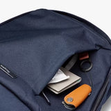 Bellroy Classic Backpack in olive green with multiple compartments and padded straps, designed for daily carrying and organization.