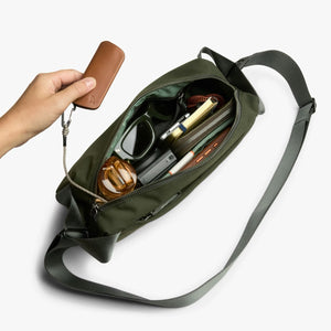 Bellroy Classic Sling 5L in black, front view showing compact design, adjustable strap, and sleek minimalist style.