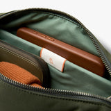 Bellroy Classic Sling 5L bag in black, showing adjustable strap and compact design for everyday carrying.