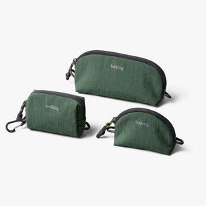 Bellroy Lite Pocket Trio packing organizers in spruce color, compact and lightweight for travel storage and organization.