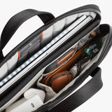 Bellroy Tokyo Laptop Bag 14-inch in raven color with padded compartments and sleek design for carrying a laptop and accessories.