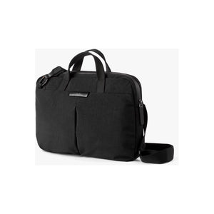 Bellroy Tokyo Laptop Bag 14-inch made of durable material, shown in sleek black with multiple compartments and carrying handles.