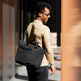 Bellroy Tokyo Messenger Bag 16-inch in raven color, featuring sleek design with adjustable shoulder strap and multiple compartments.