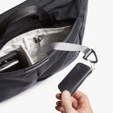 Bellroy Tokyo Messenger Bag 16-inch in Raven, showing the sleek, durable water-resistant exterior with adjustable shoulder strap.