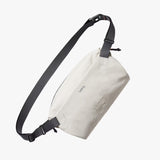Bellroy Lite Sling bag showing compact design with adjustable strap and sleek black material for everyday carry.