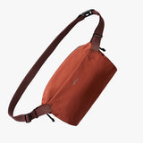 Bellroy Lite Sling bag in black with adjustable strap and compact design, perfect for carrying essentials on the go.