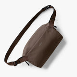 Bellroy Lite Sling bag with adjustable strap, compact design, and multiple compartments for organization.