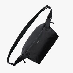 Bellroy Lite Sling bag featuring compact design, adjustable strap, and sleek black fabric, ideal for everyday essentials.