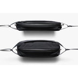 Bellroy Lite Sling bag in black with adjustable strap and compact design, ideal for carrying essentials on the go.