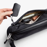 Bellroy Lite Sling bag with adjustable strap and compact design, perfect for carrying essentials in a stylish, lightweight sling.